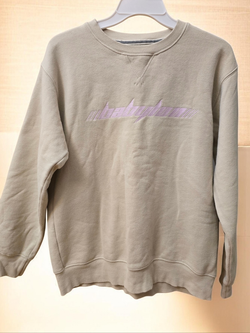 Ariztia TNA Womens Sweatshirt in Light Beige with Subtle Pink Logo